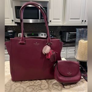 Burgundy tote style leather bag with matching crossbody.  Excellent condition